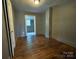 This bedroom has hardwood floors at 736 7Th Sw Ave, Hickory, NC 28602
