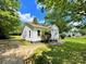 Cozy one-story home featuring well maintained lawn, a private driveway, and mature landscaping at 736 7Th Sw Ave, Hickory, NC 28602