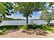 Lush backyard with mature trees leading to a private dock and lake access at 9115 Clement Cir, Terrell, NC 28682