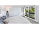 Light-filled bedroom featuring large windows with deck access at 9115 Clement Cir, Terrell, NC 28682