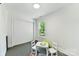 Bright bedroom featuring white walls, a window and a carpeted floor, perfect for a cozy and peaceful atmosphere at 9115 Clement Cir, Terrell, NC 28682