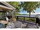 Relax on this lakeside deck offering panoramic views and comfortable seating, perfect for outdoor entertaining at 9115 Clement Cir, Terrell, NC 28682