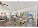 Spacious dining area with modern lighting and large windows offering stunning lake views at 9115 Clement Cir, Terrell, NC 28682