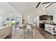 Open concept dining area with lake view, seamlessly connecting indoor and outdoor living at 9115 Clement Cir, Terrell, NC 28682