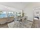 Dining and living area showcasing an open layout, modern decor and picturesque lake views at 9115 Clement Cir, Terrell, NC 28682