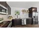 The kitchen is modern and well-equipped, with stainless appliances and dark cabinetry at 9115 Clement Cir, Terrell, NC 28682