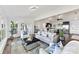 Open concept living room showcases updated furniture, hardwood floors and stainless appliances at 9115 Clement Cir, Terrell, NC 28682