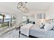 Main bedroom with a private deck overlooking the water, a modern light, and an open layout at 9115 Clement Cir, Terrell, NC 28682