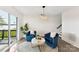 Sitting area with lake view and access to the deck at 9115 Clement Cir, Terrell, NC 28682