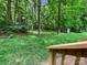 Private backyard with a tree lined lot and lush landscaping at 9116 Torrence Creek Ct, Huntersville, NC 28078