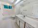 Bathroom features a large vanity, bright lighting, and a tub and shower combo at 9116 Torrence Creek Ct, Huntersville, NC 28078