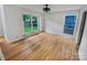 Bedroom features hardwood floors and beautiful natural light at 9116 Torrence Creek Ct, Huntersville, NC 28078