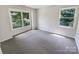 Bedroom features updated carpet and beautiful natural light at 9116 Torrence Creek Ct, Huntersville, NC 28078