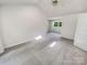 Spacious bedroom with fresh paint, updated carpet, and natural light at 9116 Torrence Creek Ct, Huntersville, NC 28078
