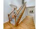 Inviting foyer featuring a hardwood floor entry and a staircase leading to the upper level at 9116 Torrence Creek Ct, Huntersville, NC 28078
