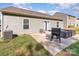 Backyard features a patio for outdoor seating and a grill for entertaining at 1109 Culver Spring Way, Charlotte, NC 28215
