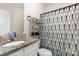 Bright bathroom vanity with granite countertop and brushed nickel hardware at 1109 Culver Spring Way, Charlotte, NC 28215