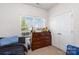 Relaxing bedroom featuring neutral walls, a dresser, and natural light at 1109 Culver Spring Way, Charlotte, NC 28215