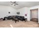 Cozy living room with high ceilings and plush carpeting, creating an inviting space for relaxation and entertainment at 1109 Culver Spring Way, Charlotte, NC 28215