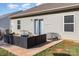 This home has a concrete patio with a modern outdoor seating area, ideal for entertaining at 1109 Culver Spring Way, Charlotte, NC 28215