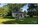 Charming one-story home with a cozy covered patio and a spacious backyard, perfect for outdoor activities at 116 Barnes Ln, Stony Point, NC 28678