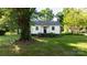 Well-maintained home with manicured landscaping, mature trees, and traditional architecture at 116 Barnes Ln, Stony Point, NC 28678