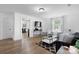 Inviting living room with modern furniture, stylish rug, and great natural light at 116 Barnes Ln, Stony Point, NC 28678