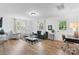 Spacious living room with stylish furniture and access to a home office area at 116 Barnes Ln, Stony Point, NC 28678