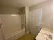 Bathroom with standard tub-shower, sink, and tile flooring at 118 Steam Engine Dr # 201, Mooresville, NC 28115