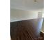 Bright and airy living room with sleek flooring and ample natural light at 118 Steam Engine Dr # 201, Mooresville, NC 28115
