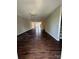 Spacious living room featuring hardwood floors and an open floor plan at 118 Steam Engine Dr # 201, Mooresville, NC 28115