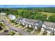 Aerial view of well-maintained townhomes with manicured lawns in a desirable neighborhood at 12021 Basking Dr, Charlotte, NC 28214