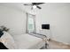 Neutral bedroom featuring a bed, dresser, and window at 12021 Basking Dr, Charlotte, NC 28214