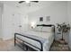 Neutral bedroom featuring a bed, end table, and closet at 12021 Basking Dr, Charlotte, NC 28214