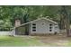 Charming single-story home features a well-maintained lawn and traditional architectural details at 124 Roxie Ln, Belmont, NC 28012