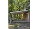 Spacious covered patio, perfect for outdoor entertaining and relaxation at 1336 Norris Ave, Charlotte, NC 28206