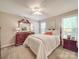 Comfortable bedroom with a large bed, matching dressers, and natural light at 135 Henry Putnam Dr, Cherryville, NC 28021