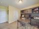 Well-lit home office with built-in desk and storage, offering functionality and style at 135 Henry Putnam Dr, Cherryville, NC 28021