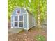 A storage shed featuring a ramp for easy access to equipment and tools at 135 Henry Putnam Dr, Cherryville, NC 28021