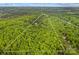 Aerial shot showing land boundary, surrounded by vast green forest at 140 Hearthstone Dr, Statesville, NC 28677