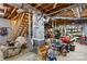 Unfinished basement space showing utilities, storage and wooden stairs at 140 Hearthstone Dr, Statesville, NC 28677