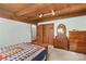 Bright bedroom featuring white walls and wood accents, paired with a dresser at 140 Hearthstone Dr, Statesville, NC 28677