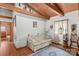 Cozy living room with wooden ceiling, comfortable seating, and natural light at 140 Hearthstone Dr, Statesville, NC 28677