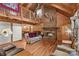Open living room showcasing a grand fireplace, high ceilings, and natural wood accents throughout at 140 Hearthstone Dr, Statesville, NC 28677