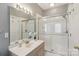 Bright bathroom featuring a glass-enclosed shower, modern vanity, and clean finishes at 14118 Yachtsman Harbor Dr, Charlotte, NC 28278
