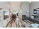Spacious open-concept living room with modern furnishings, dining area and hardwood flooring at 14118 Yachtsman Harbor Dr, Charlotte, NC 28278