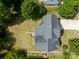 Aerial view from above features a deck with a gray roof that is surrounded by greenery at 1465 Porters Ct, Concord, NC 28025