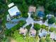 Aerial view of the community shows the pool, walking trails, community amenities, and homes at 1465 Porters Ct, Concord, NC 28025