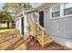 View of backyard, showcasing a small set of steps that lead to the home's entrance and ample space for outdoor enjoyment at 1637 Sumner Dr, Rock Hill, SC 29732