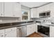 Modern kitchen features stainless steel appliances, bright cabinetry, and ample counter space at 1637 Sumner Dr, Rock Hill, SC 29732